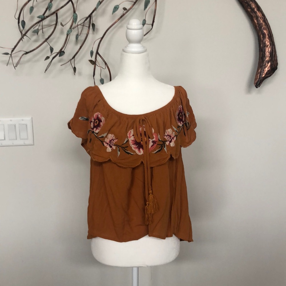 Off the shoulder floral accent top